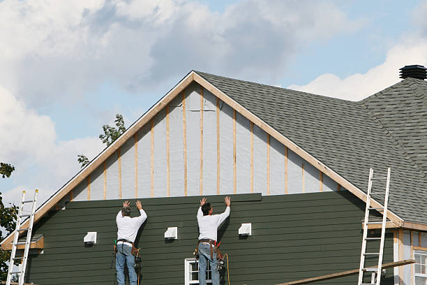Professional Siding Replacement technician working in Piney Point, MD